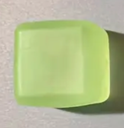 Green rectangular object on a gray background