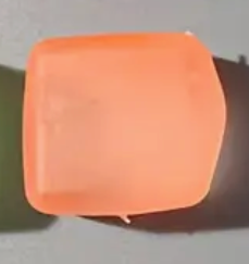 Orange object on a gray background