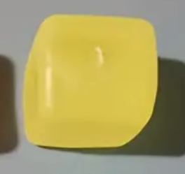 Yellow square object on a gray background