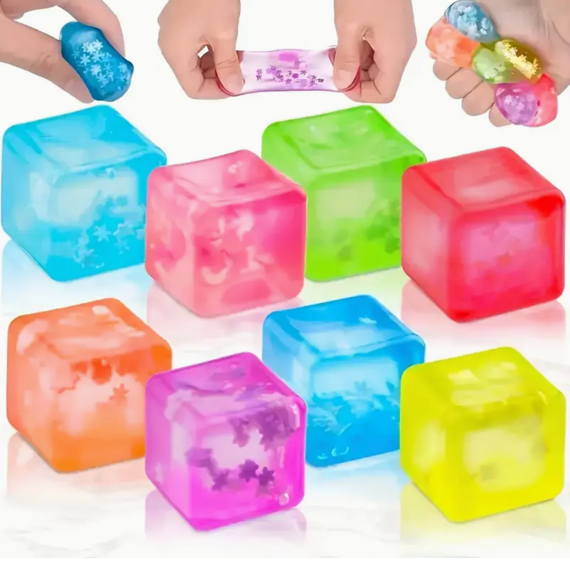 Colorful ice cube trays with hands holding colorful items on a white background