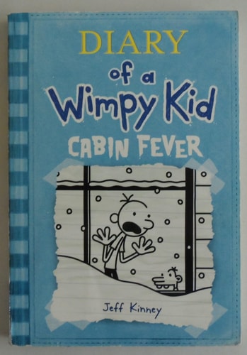 Cover of "Diary of a Wimpy Kid: Cabin Fever" by Jeff Kinney, featuring Greg Heffley looking out a window at heavy snowfall.