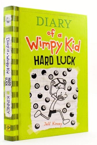 Cover of "Diary of a Wimpy Kid: Hard Luck" by Jeff Kinney, featuring Greg Heffley surrounded by clovers, symbolizing his quest for better fortune.