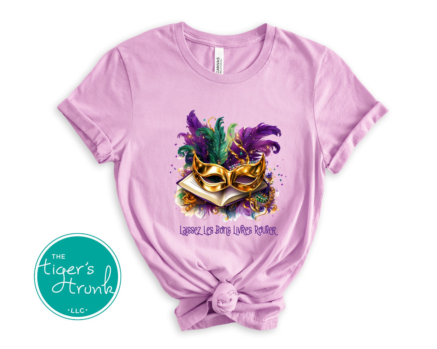 Pink t-shirt with Mardi Gras mask design and 'The Tiger's Strunk' logo.