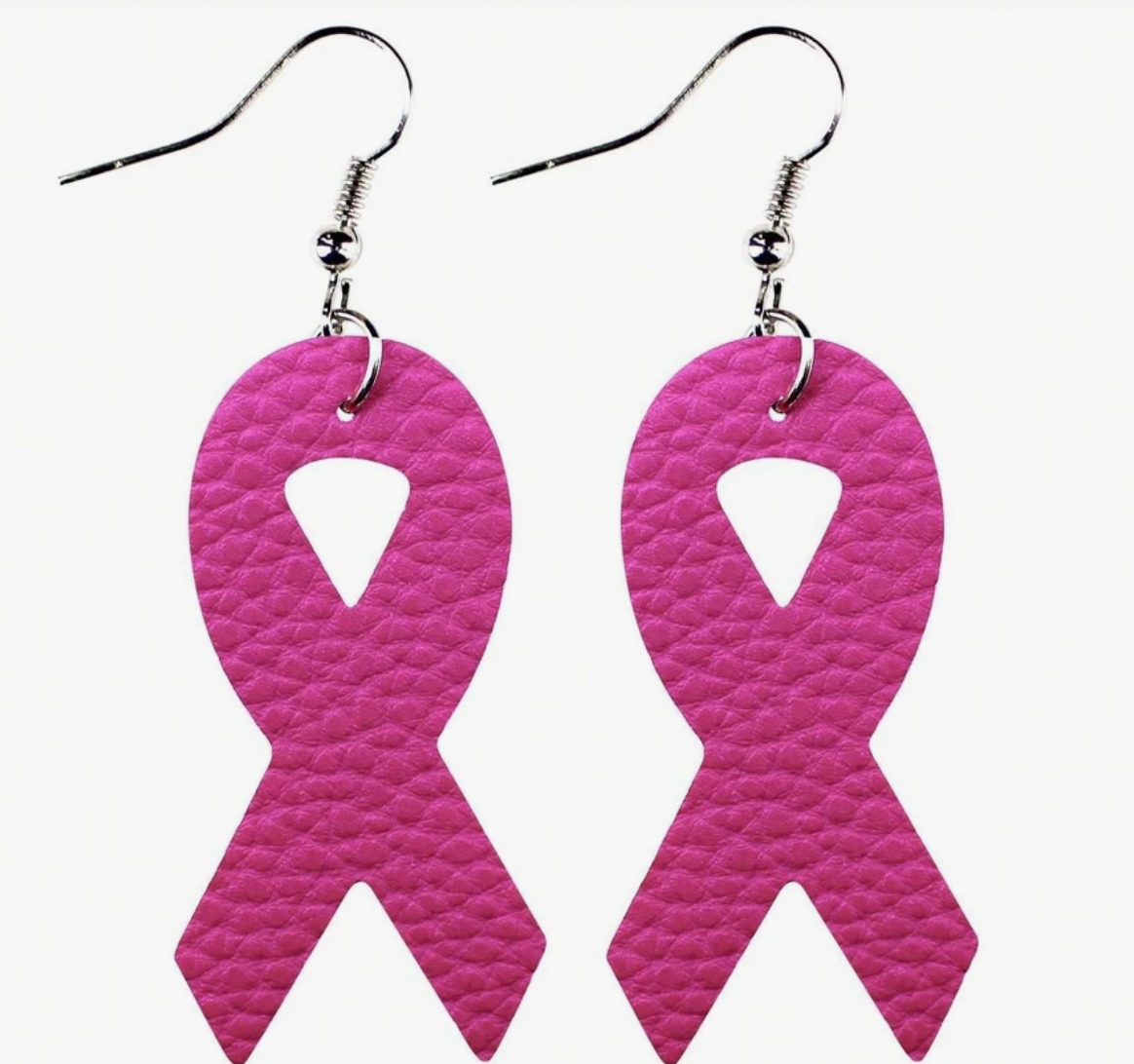 Pink ribbon earrings on a white background