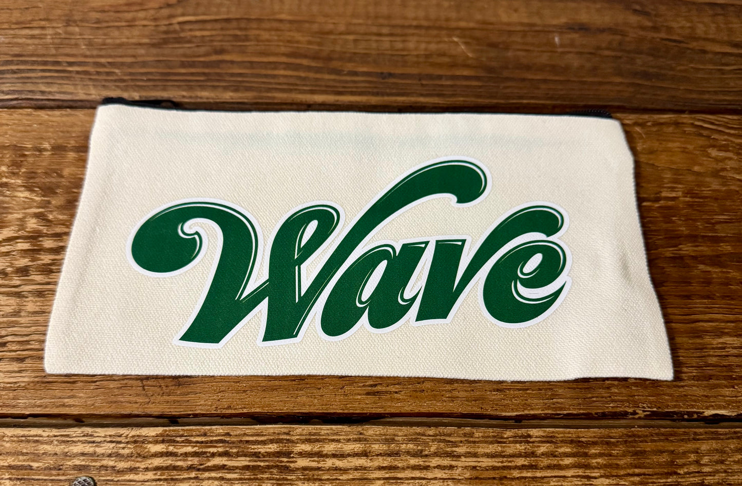 Accessories makeup pouch featuring the word Wave, representing the local school mascot, the Greenwave.