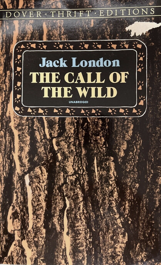 Cover of 'The Call of the Wild' by Jack London, featuring a brown tree trunk with the book's title and author's name.
