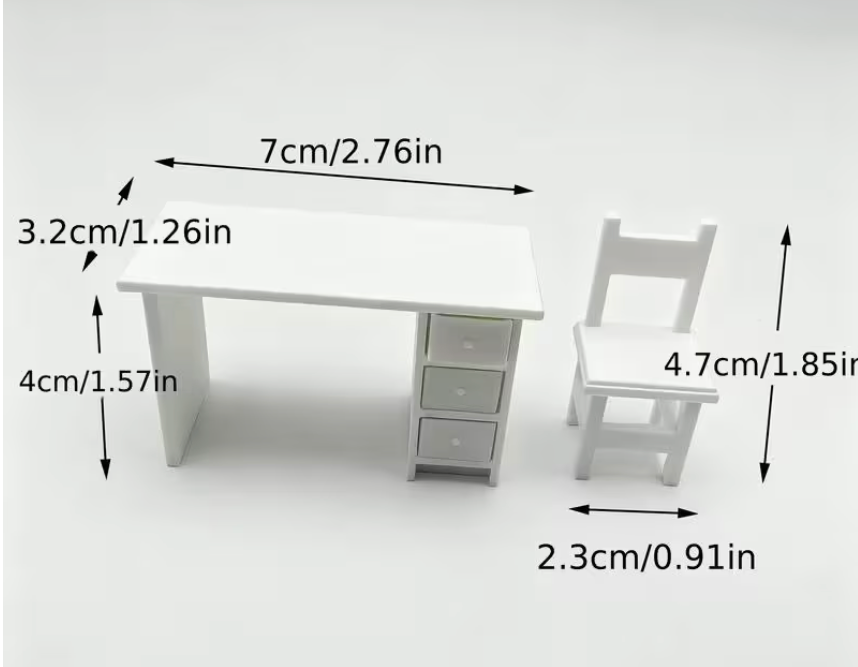 Miniature white desk and chair set with three pull-out drawers for dollhouses, dioramas, fairy gardens, and miniature office scenes.