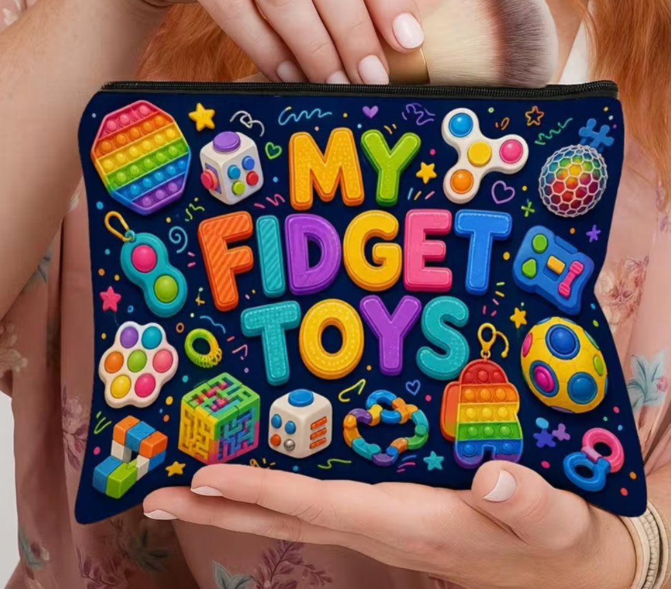 Colorful My Fidget Toys zippered storage pouch featuring pop-it toys, fidget spinners, sensory cubes and rainbow fidget designs on a navy blue background