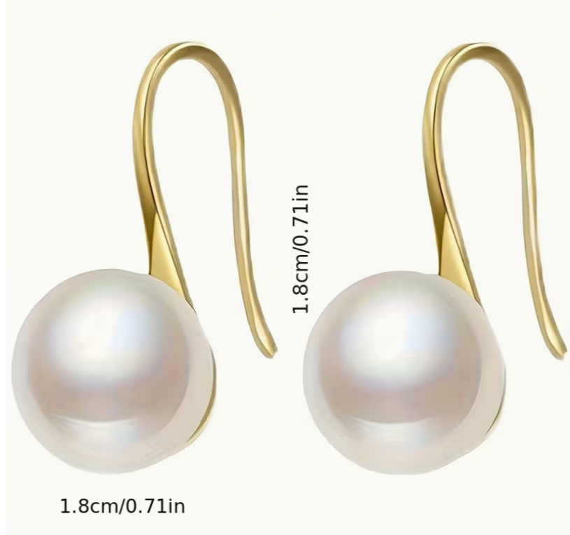 Gold tone pearl drop earrings showing size measurement and hook detail