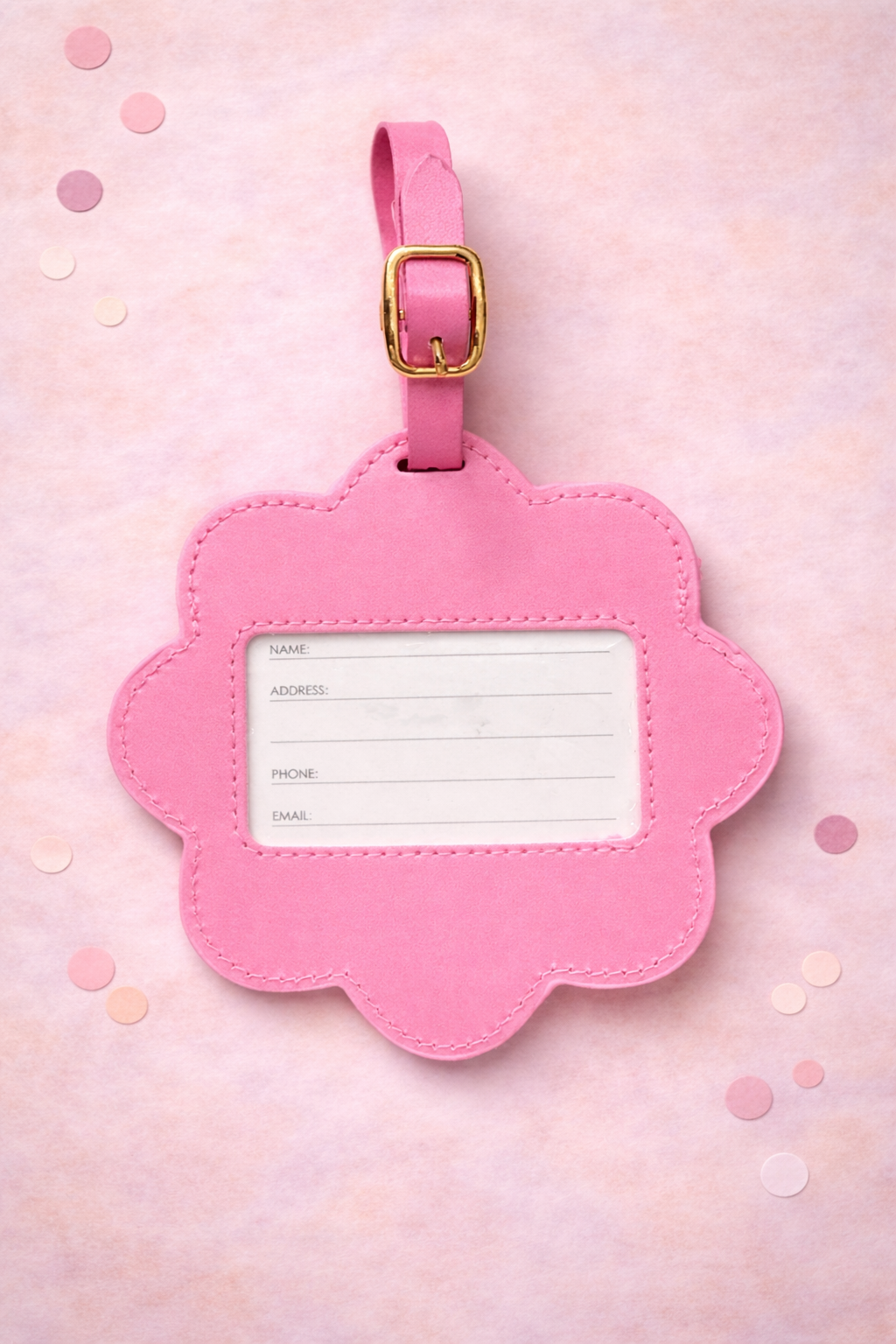 Back view of pink flower luggage tag showing ID window for name and contact information