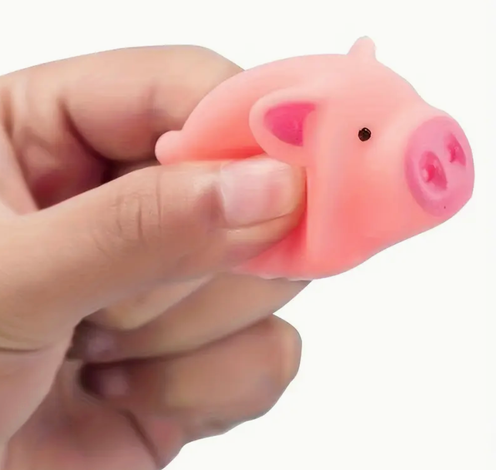 2-inch pink squeaky pig toy, soft and lightweight, perfect for stress relief, playtime, or a fun novelty gift.