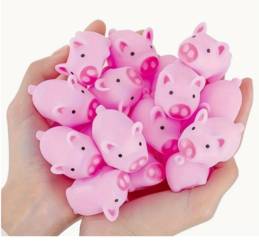 2-inch pink squeaky pig toy, soft and lightweight, perfect for stress relief, playtime, or a fun novelty gift.