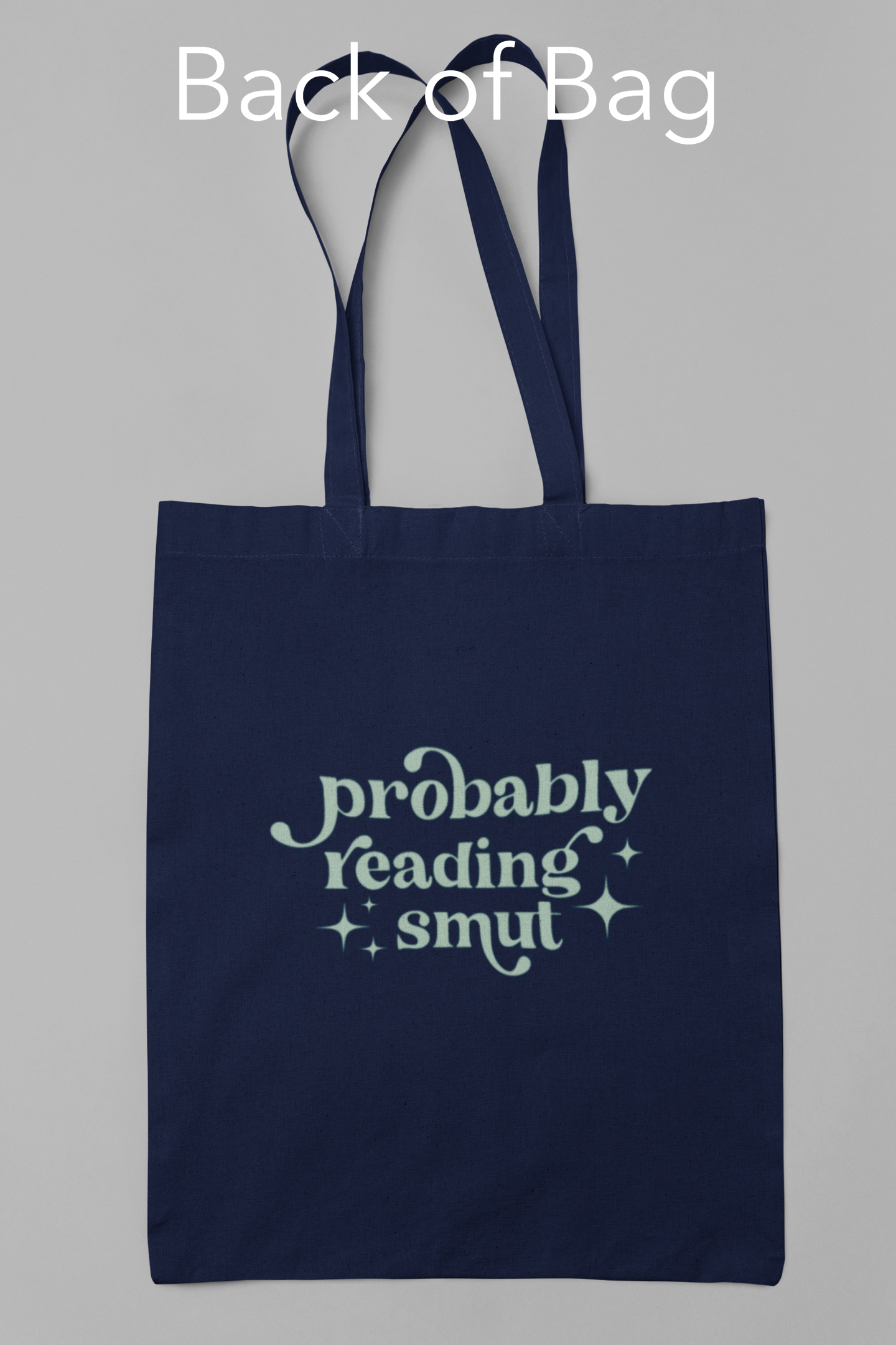 Canvas tote bags featuring The Burrow Bookstore logo on one side and various literary quotes on the other side.