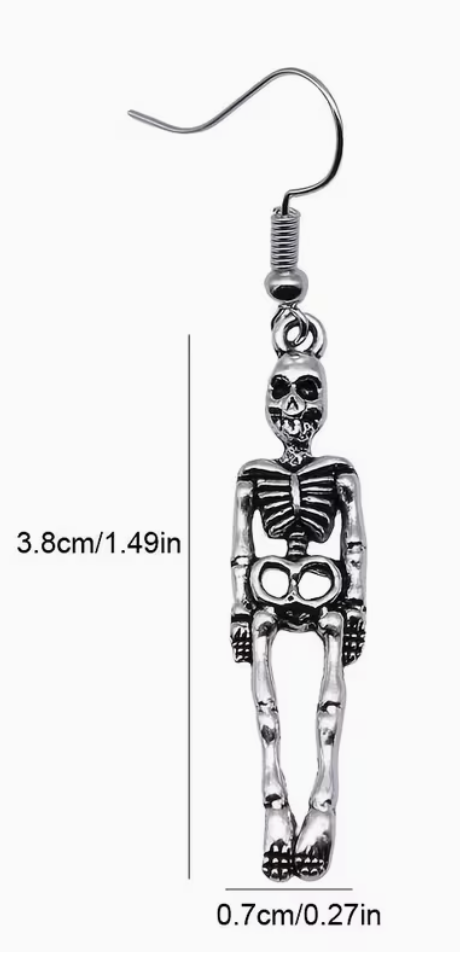 Pair of silvery skeleton dangle earrings with detailed skull and bone charms