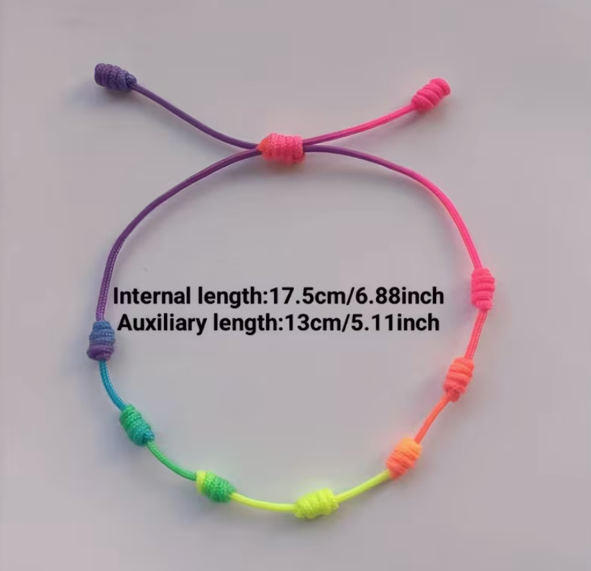 Rainbow seven knot adjustable anklet bracelet with colorful cord design and size measurements displayed on a neutral background