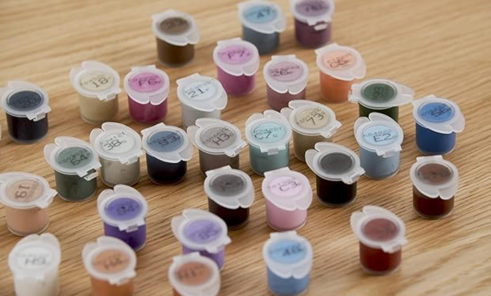 Ravensburger CreArt Take a Seat Eames Collector's Edition paint by numbers kit featuring mid-century modern chair designs.