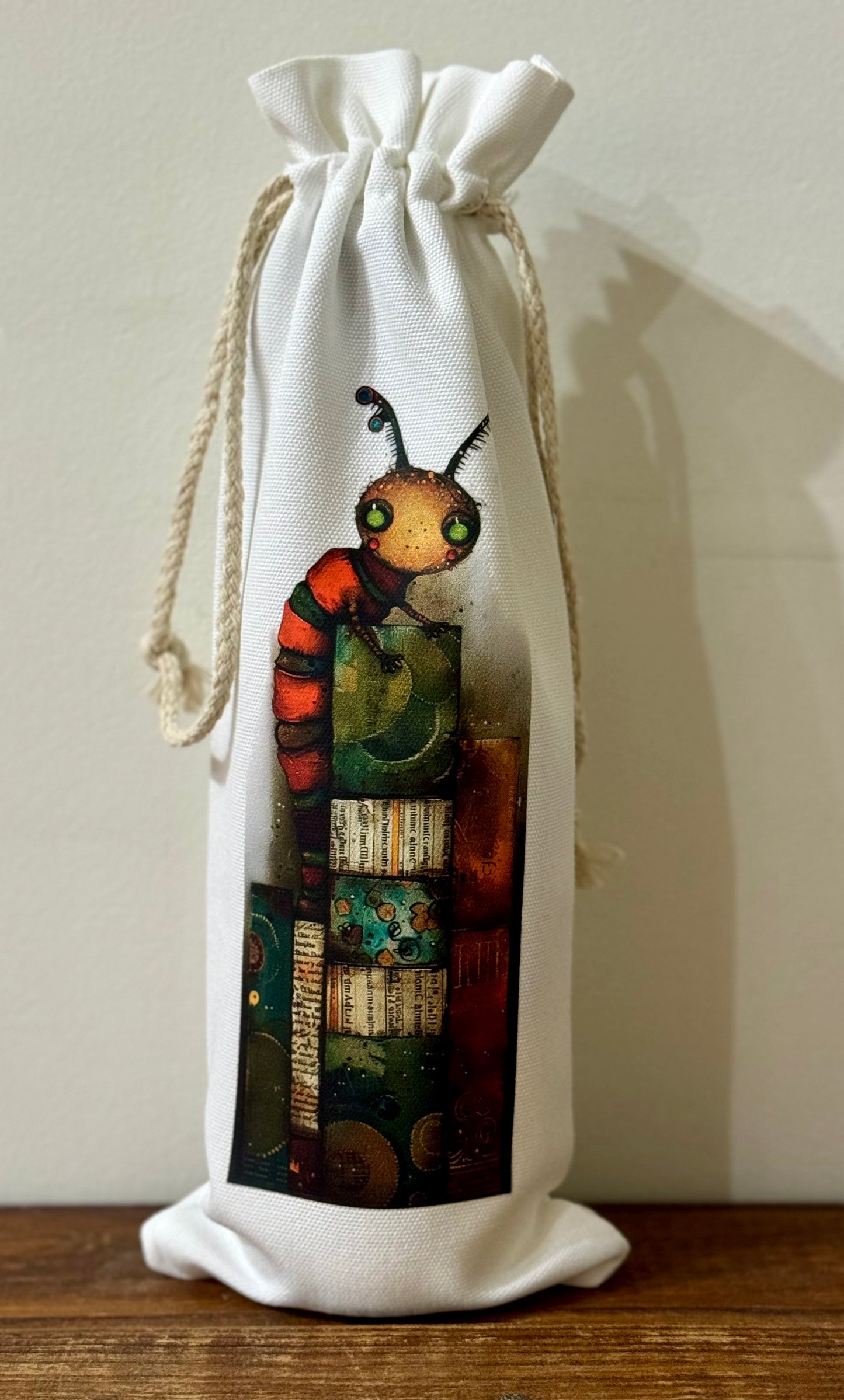 Reusable wine gift bag with the Bookworm design, an eco-friendly and stylish tote for book lovers and wine enthusiasts.