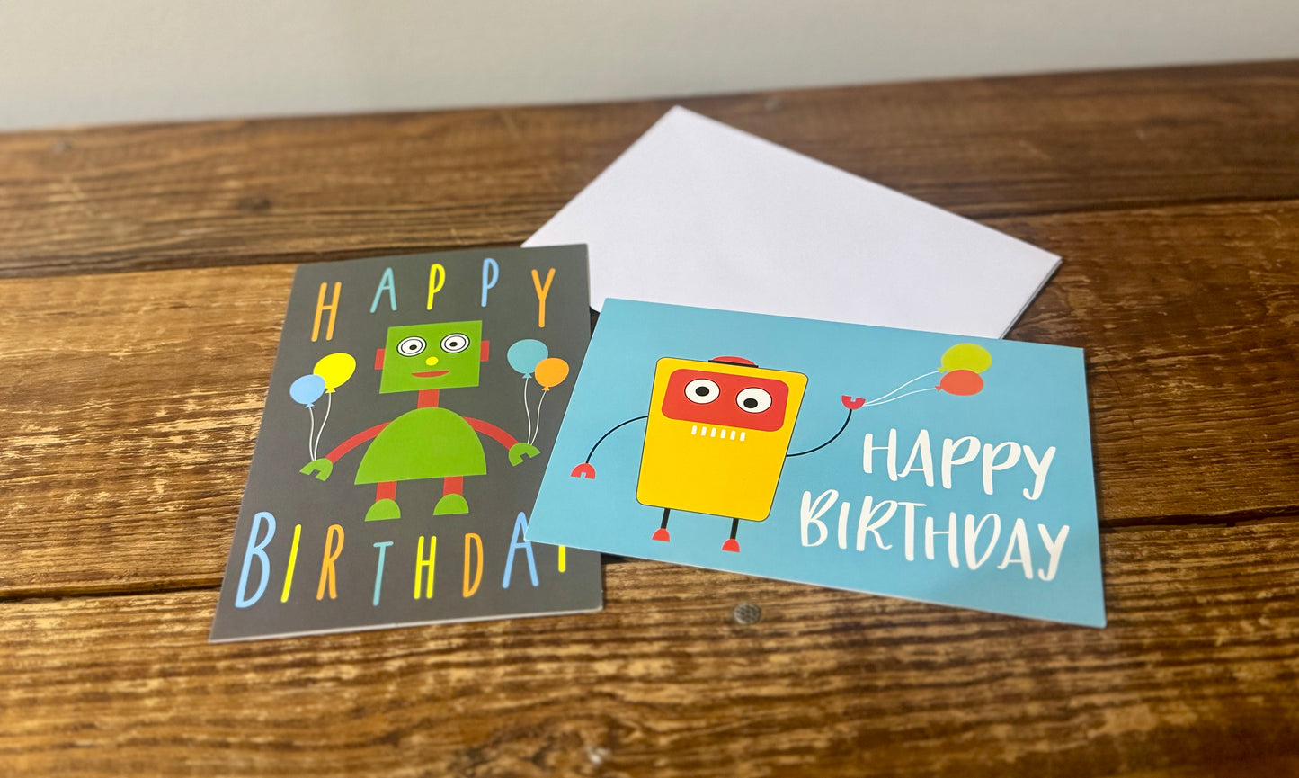 A set of 3 Happy Birthday cards featuring playful robot designs, including one blue and two gray cards.