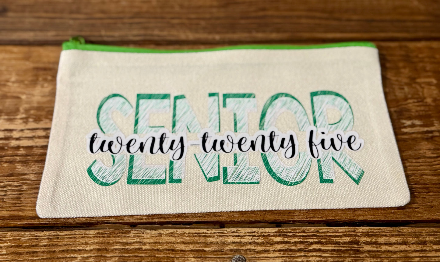 5"x8" zippered carry-all bag featuring the phrase Senior 2025, perfect for holding school supplies, graduation essentials, or everyday accessories.