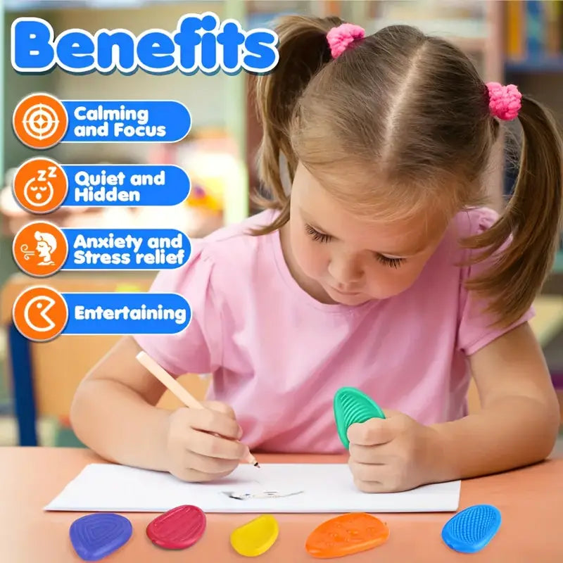 Smooth, stone-shaped sensory fidget toys in assorted calming colors, designed for stress relief, grounding, and tactile focus.