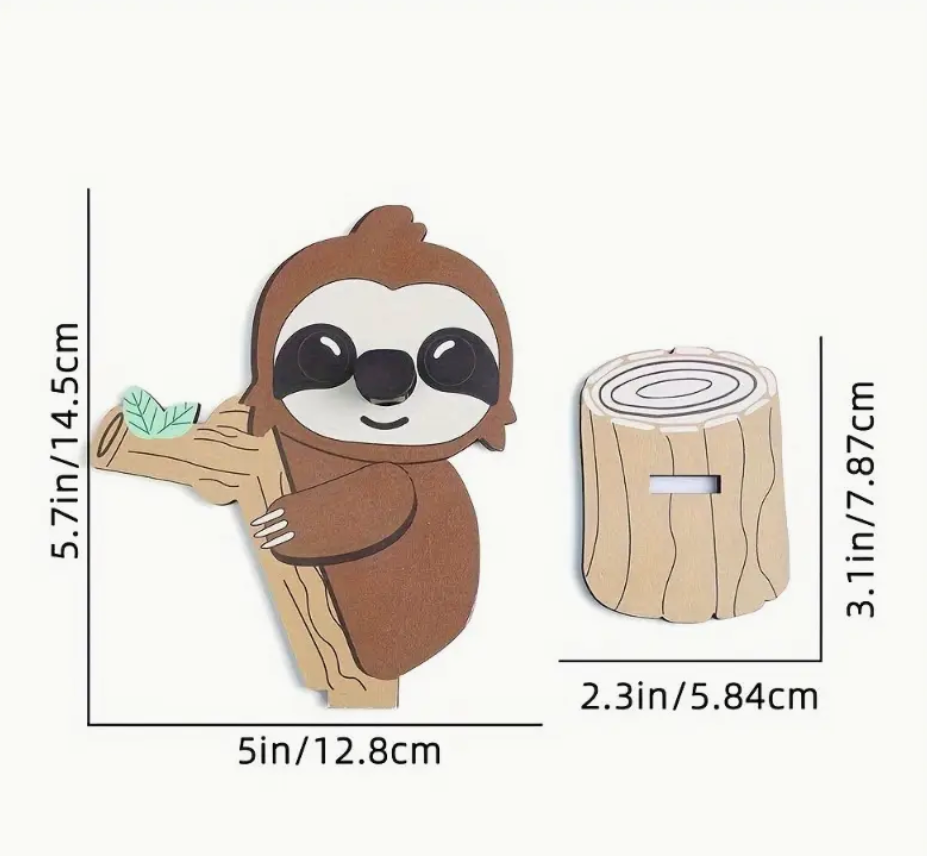 Sloth-shaped eyeglass holder stand displaying a pair of glasses.