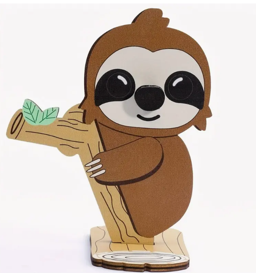 Sloth-shaped eyeglass holder stand displaying a pair of glasses.