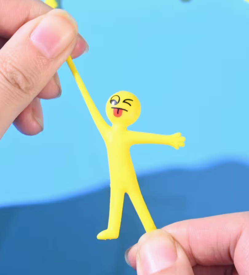 stretchy yellow character fidget toy being pulled between two hands with playful winking face