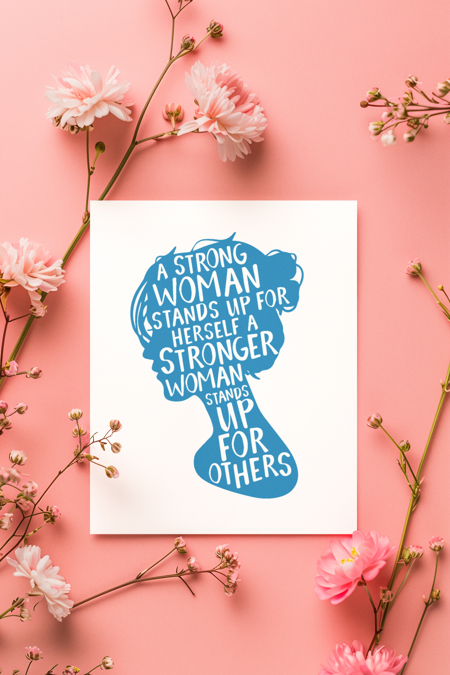 A Women’s History Month postcard featuring the silhouette of a woman’s head and the empowering quote: A strong woman stands up for herself. A stronger woman stands up for others.