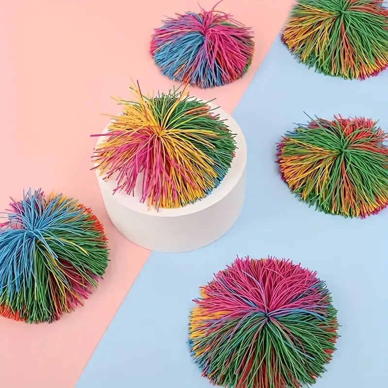 Set of rainbow-colored soft and stretchy sensory play balls, ideal for stress relief, party favors, or holiday gifts for all ages.