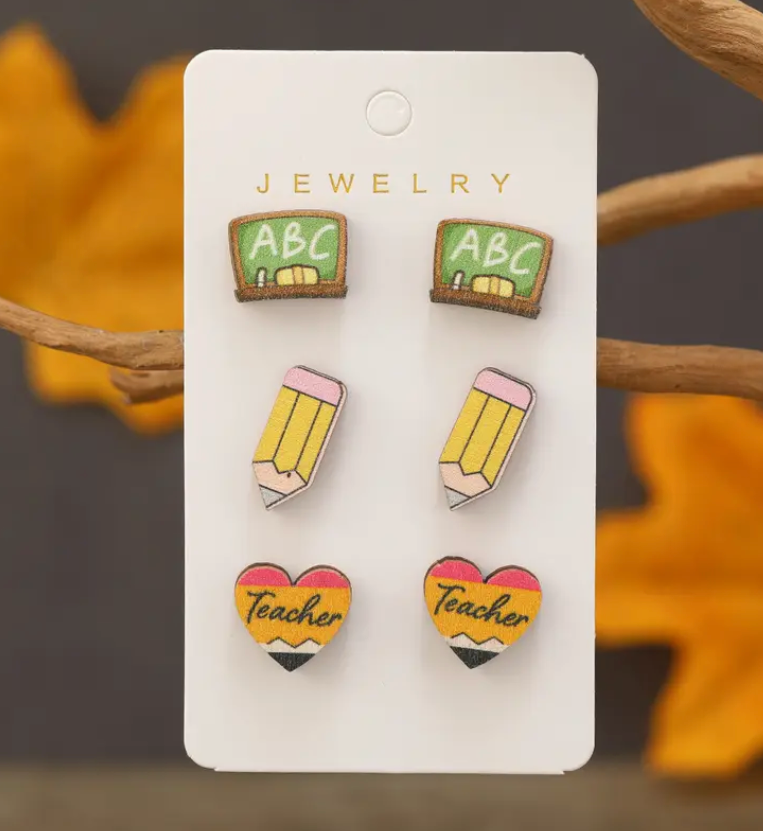 Set of three pairs of wooden earrings for teachers, including chalkboards that say ABC, classic yellow pencils, and red hearts with the word Teacher.