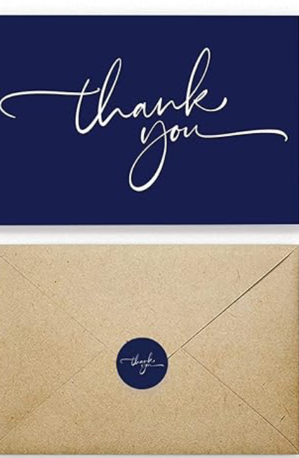 A simple and elegant "Thank You" greeting card, accompanied by an envelope and two decorative stickers.