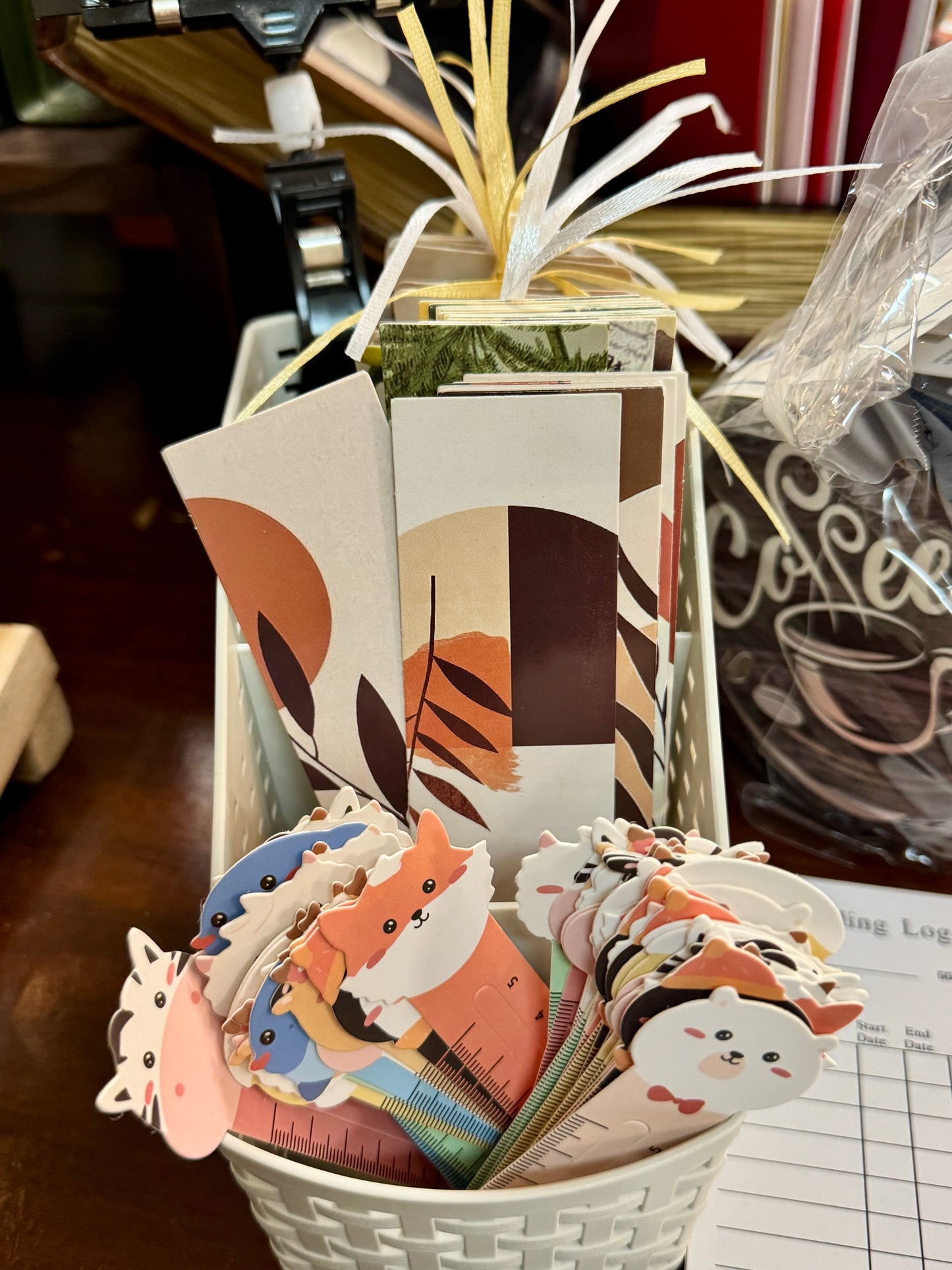 A variety of colorful bookmarks in assorted designs, laid out on a table, perfect for book lovers.