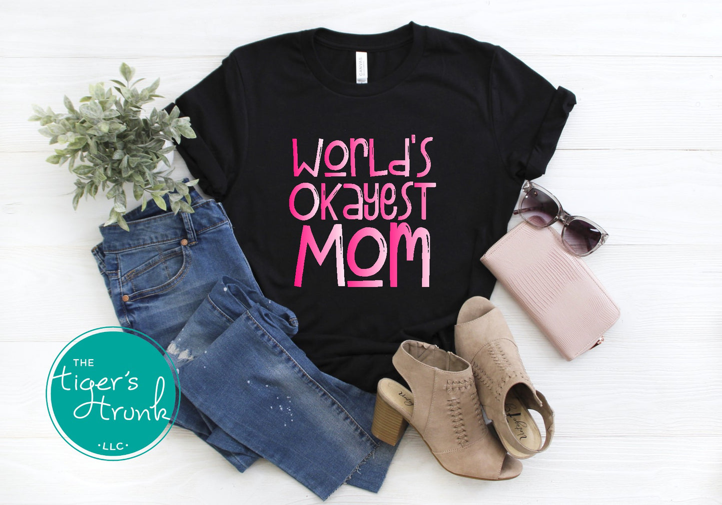 Funny graphic t-shirt with "World’s Okayest Mom" phrase, casual and relatable gift idea for Mother’s Day or everyday mom life