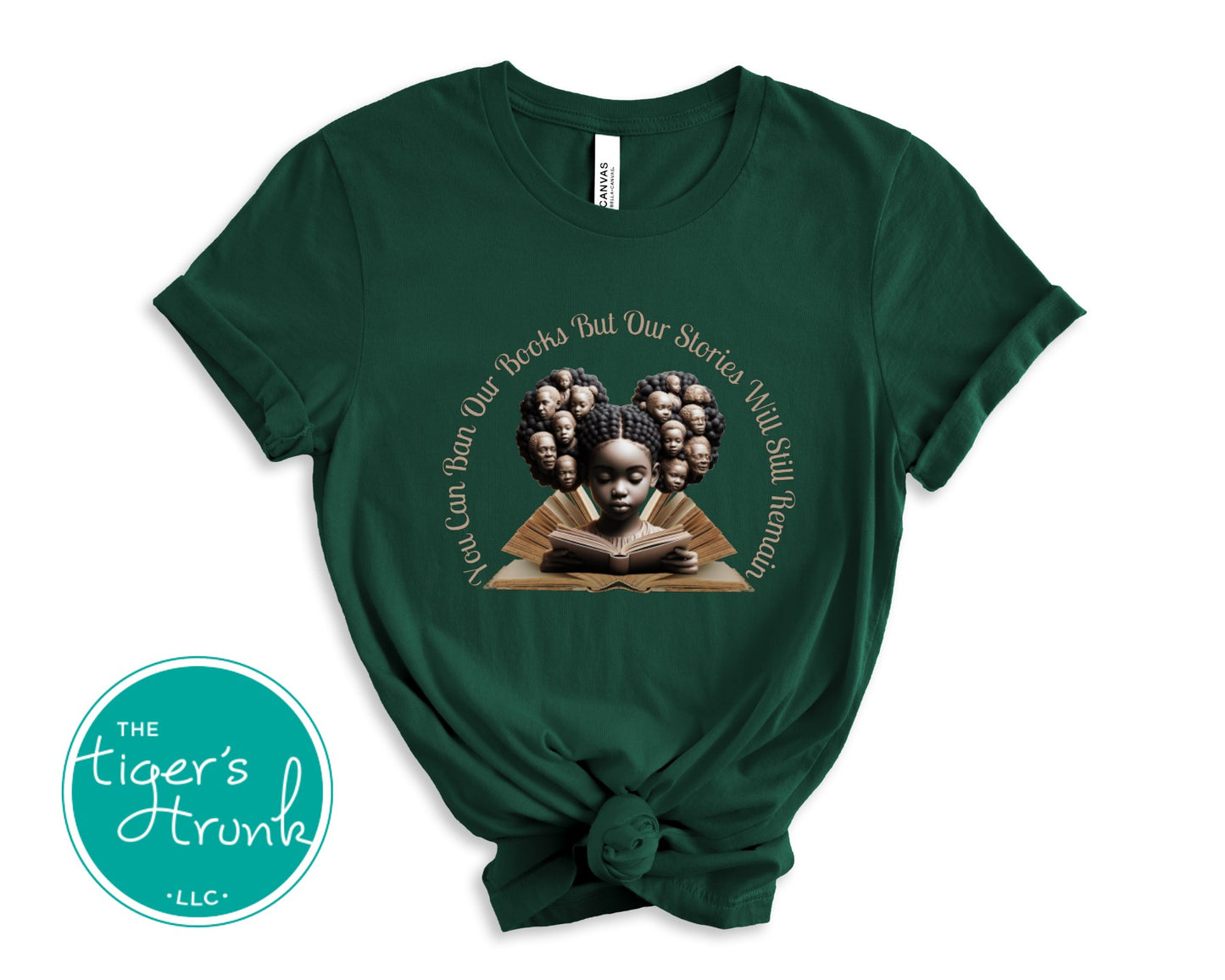 Green t-shirt with a graphic of a child reading a book and text, branded with 'The Tiger's Trunk'.