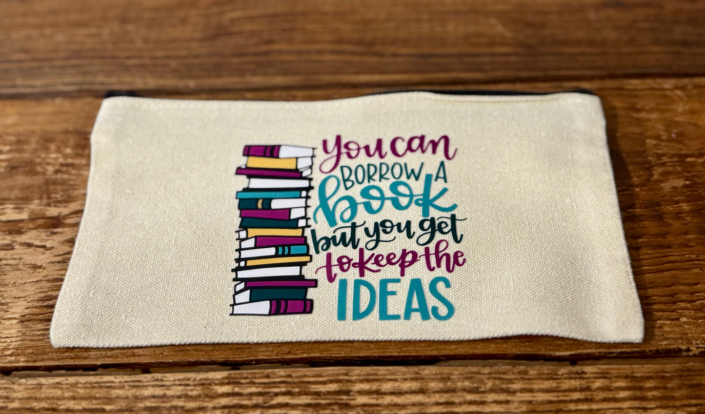 5"x8" zippered carry-all bag featuring the phrase You Can Borrow a Book but You Get to Keep the Ideas, perfect for book lovers, library enthusiasts, and lifelong learners.