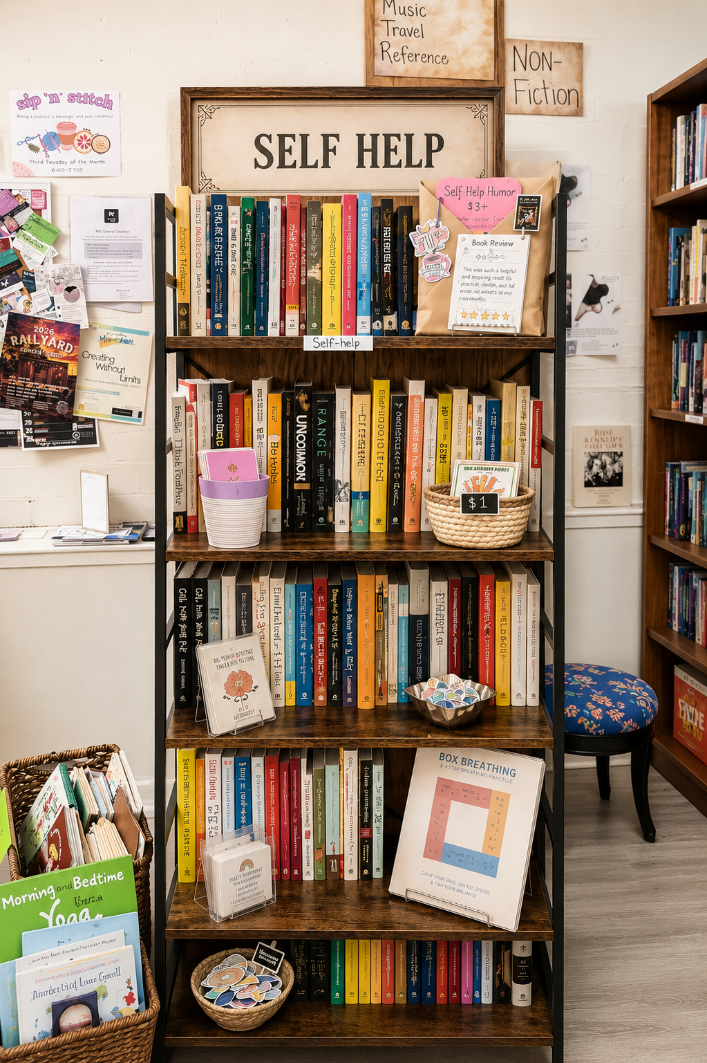 A calm bookstore display featuring self-help and wellness books arranged beside a cozy candle, a small plant, and soft natural light to create a peaceful, encouraging atmosphere.
