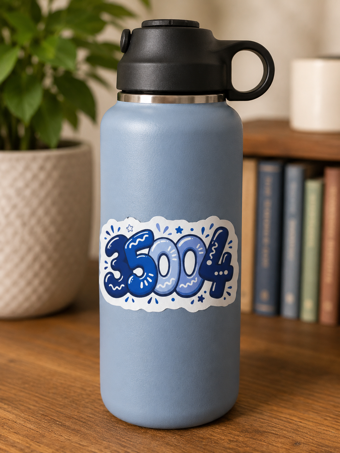 Blue 35004 school spirit sticker displayed on a light blue water bottle