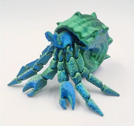 Colorful 3D printed hermit crab with articulated movable legs and detailed shell displayed on a white background.