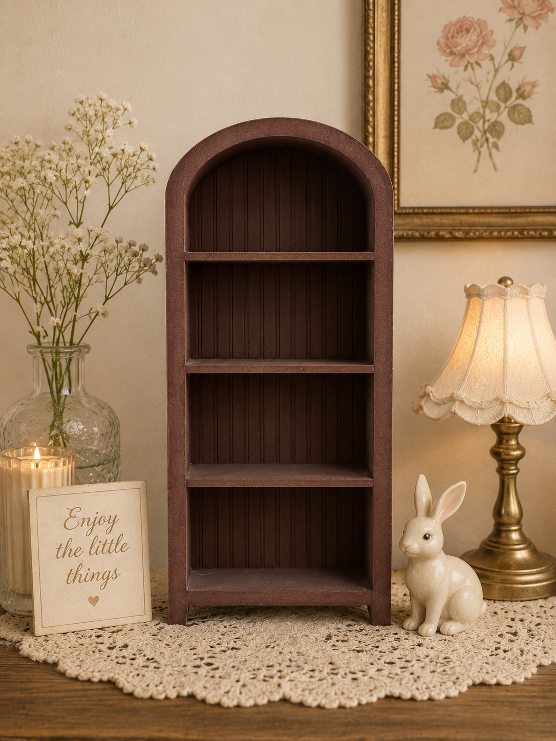 3D printed mini bookshelf with arched top displayed in cozy cottagecore decor setting