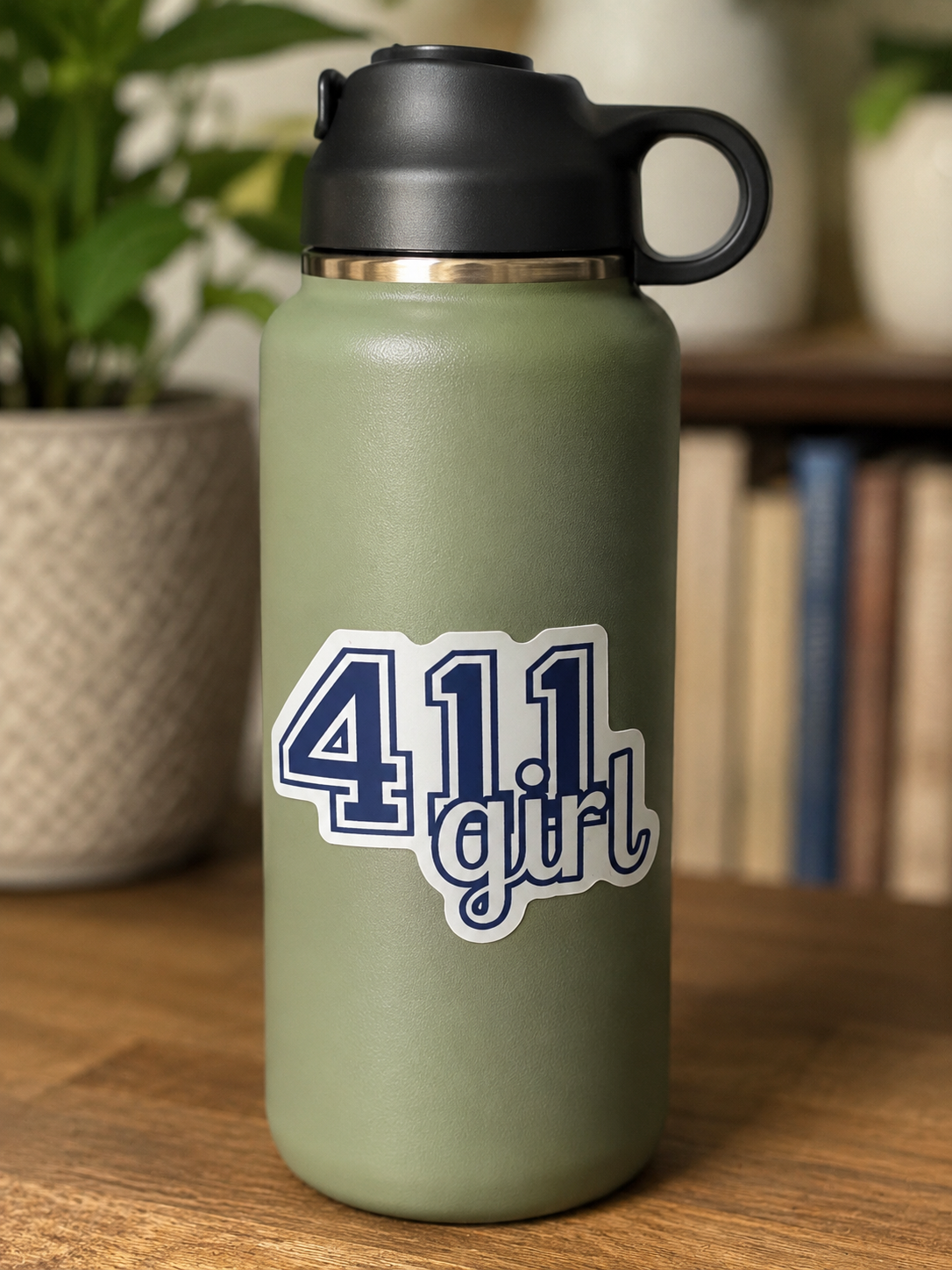 Navy and white 411 Girl sticker displayed on a sage green water bottle