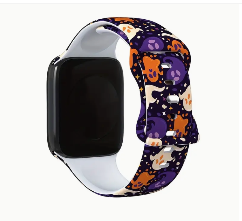 Smartwatch with a colorful Halloween-themed band on a white background