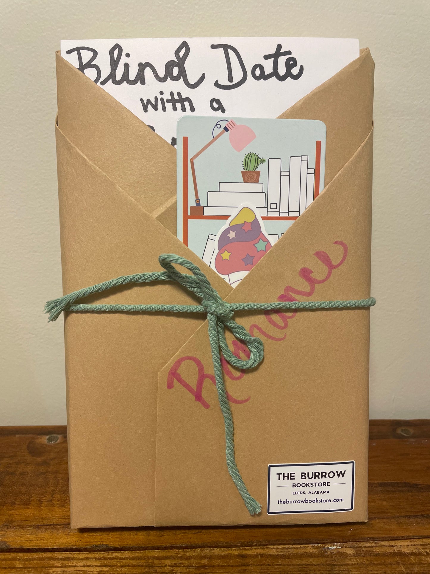 A Blind Date with a Book package featuring a wrapped book, perfect for book lovers, available in all genres and various budgets.