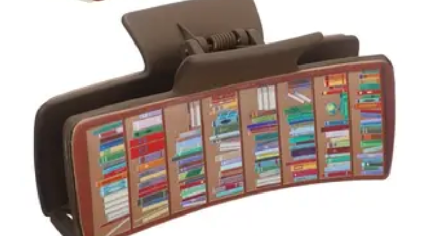 Multicolored bookshelf claw clip model on a white background