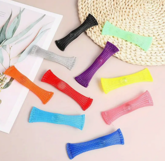 Colorful mesh marble fidgets on a neutral background