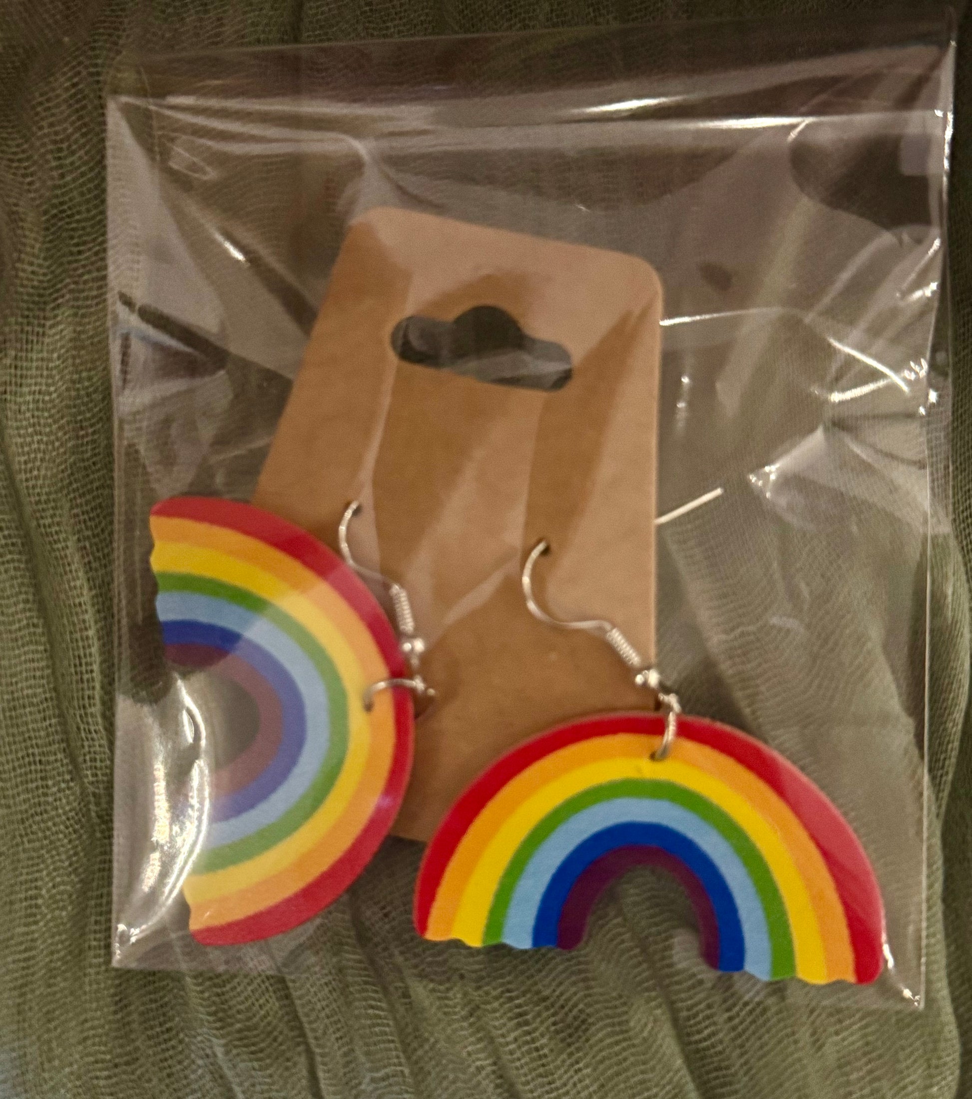 Colorful faux leather rainbow dangle earrings with lightweight material for Pride or everyday wear