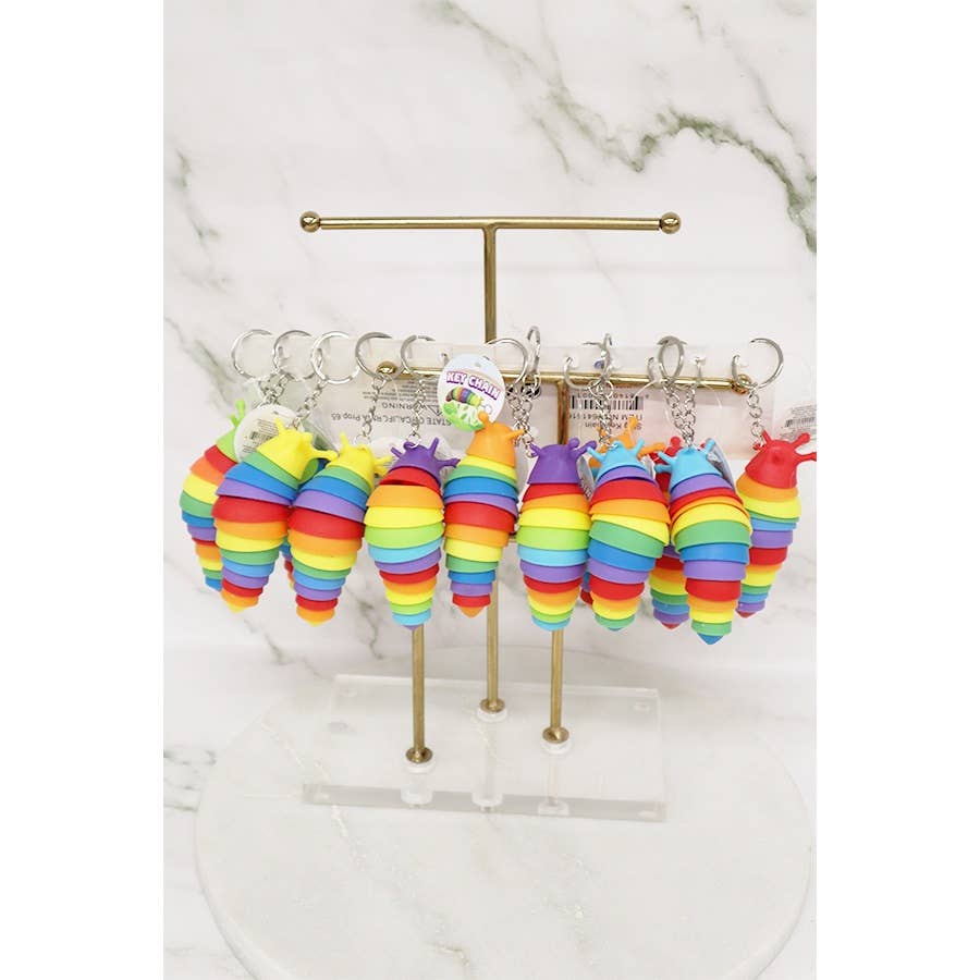 Rainbow-colored 4-inch fidget slug keychain with articulated body for stress relief and sensory play