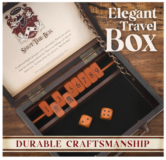 Elegant travel box with dice and number cards on a wooden surface