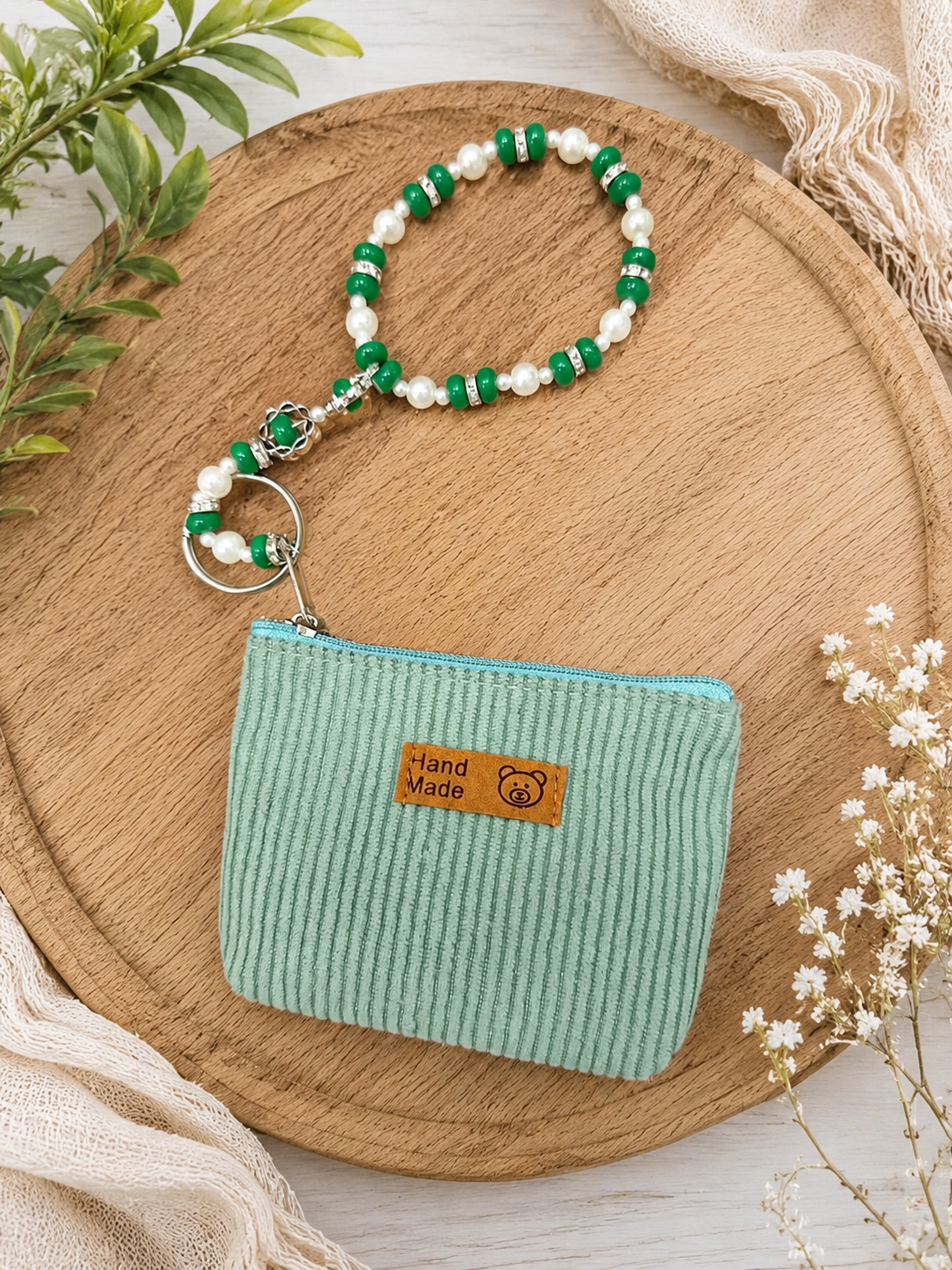 reen and white beaded wristlet keychain with mint green zippered mini pouch