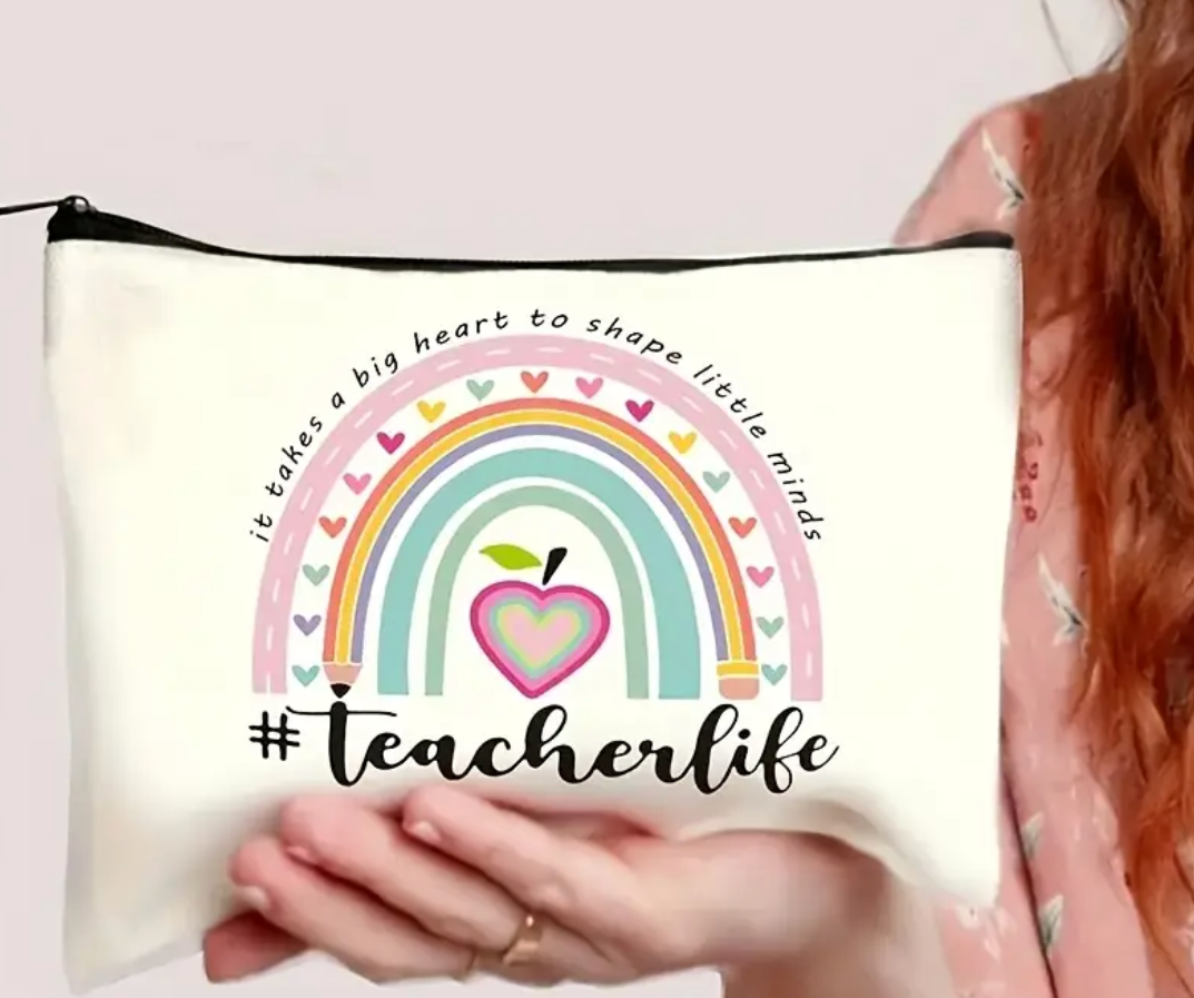 Canvas accessories pouch with the phrase It Takes a Big Heart to Shape Little Minds #teacherlife—perfect for teachers to carry supplies or essentials.