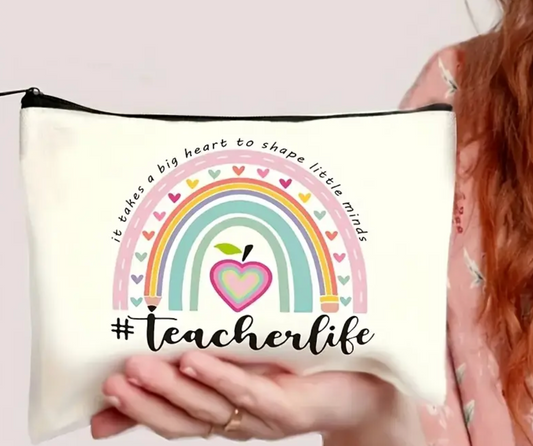 Canvas accessories pouch with the phrase It Takes a Big Heart to Shape Little Minds #teacherlife—perfect for teachers to carry supplies or essentials.